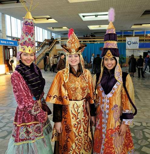 Kazakhstan people - Girls wearing national costumes (modern style) photo